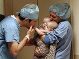 В Миннесоте врачи разделили сиамских близнецов, сросшихся животами В Миннесоте врачи разделили сиамских близнецов, сросшихся животами
