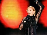 Мировое турне Мадонны началось со скандала - она спела "распятой" на кресте