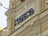 В первый день торгов на российском рынке акции компании "Роснефть" подешевели на 2%, упав ниже цены размещения