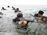 В заявлении, распространенном в Пхеньяне от имени представителя вооруженных сил КНДР в Панмунчжоне, где поддерживаются контакты между военными из двух корейских государств, утверждается, что эти маневры перечеркивают перемирие между ними от 1953 года В заявлении, распространенном в Пхеньяне от имени представителя вооруженных сил КНДР в Панмунчжоне, где поддерживаются контакты между военными из двух корейских государств, утверждается, что эти маневры перечеркивают перемирие между ними от 1953 года
