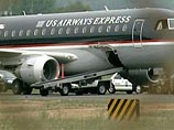 После приземления в аэропорту Трай-ситиз в городе Блаунтвилл самолет, выполнявший по заказу более крупного перевозчика - US Airways рейс из Филадельфии в Хьюстон, обыскали кинологи с собаками, натасканными на поиск взрывчатки