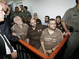 Израильский военный суд отпускает под залог 18 депутатов и 3 министров от "Хамаса" Израильский военный суд отпускает под залог 18 депутатов и 3 министров от "Хамаса"