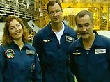 Экипаж 14-й экспедиции - россиянин Михаил Тюрин и астронавт NASA Майкл Лопес-Алегриа, а также первая женщина - Аньюша Ансари