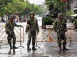 После переворота в Таиланде экс-премьер уехал в Лондон. Военные прочат его место главе Центробанка. Тот не хочет После переворота в Таиланде экс-премьер уехал в Лондон. Военные прочат его место главе Центробанка. Тот не хочет