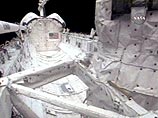 Космический корабль многоразового использования Atlantis будет оставаться на орбите по меньшей мере сутки, пока не станет ясно, что за объект был замечен членами экипажа "челнока"