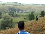 В районе катастрофы самолета Ту-154 под Донецком найдено тело женщины В районе катастрофы самолета Ту-154 под Донецком найдено тело женщины