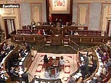 В Испании молодые люди, проникнув в парламент, захватили кресло премьер-министра В Испании молодые люди, проникнув в парламент, захватили кресло премьер-министра