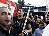 Сторонники "Хизбаллах" вышли на улицы, требуя отставки правительства Ливана Сторонники "Хизбаллах" вышли на улицы, требуя отставки правительства Ливана