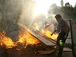 В Чили противники режима Пиночета отмечают его кончину: шесть полицейских ранены В Чили противники режима Пиночета отмечают его кончину: шесть полицейских ранены