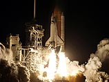 Американский космический корабль многоразового использования Doscovery не был поврежден при ночном запуске, состоявшемся в субботу Американский космический корабль многоразового использования Doscovery не был поврежден при ночном запуске, состоявшемся в субботу