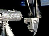 "Переходные люки между Международной космической станцией и шаттлом были открыты около 02:53 по московскому времени", - сообщили ИТАР-ТАСС в группе NASA подмосковного ЦУП