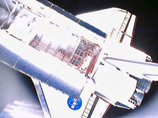 Американский космический корабль многоразового использования Discovery в пятницу возвращается на землю