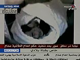 Иракское ТВ показало тело Саддама Хусейна Иракское ТВ показало тело Саддама Хусейна