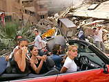 Первое место жюри присудило Спенсеру Платту за фотографию, на которой запечатлена беспечная ливанская молодежь, проезжающая в красном кабриолете на фоне кварталов Бейрута, разрушенного израильскими бомбами
