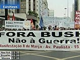 Бразильцы встречают американского президента Джорджа Буша, прибывающего в страну с визитом, многочисленными акциями протеста против политики США в мире и в регионе Латинской Америки