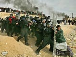 Героиня фотографии, получившей премию Пулитцера: после снимка полиция меня избила Героиня фотографии, получившей премию Пулитцера: после снимка полиция меня избила
