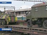 Сотрудники телекомпании "Мзе" снимали погрузку российской техники в эшелон под наблюдением грузинской военной полиции.