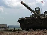 Из Грузии в Россию в четверг утром железнодорожным эшелоном отправлены 44 единицы автомобильной техники и часть имущества российской военной базы в Батуми