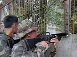 Филиппинские боевики взяли 60 человек в заложники, но отпустили, испугавшись вертолета