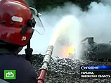 Новое ЧП на железной дороге Украины: из цистерны вылилась соляная кислота Новое ЧП на железной дороге Украины: из цистерны вылилась соляная кислота