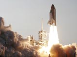 NASA: небольшие куски изоляционной пены столкнулись с шаттлом при взлете NASA: небольшие куски изоляционной пены столкнулись с шаттлом при взлете
