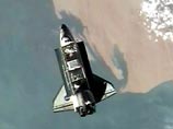 Американский шаттл Endeavour с семью астронавтами на борту состыковался в пятницу с Международной космической станцией (МКС)