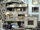 Из-под руин рухнувшего в Баку здания извлечено тело еще одного человека Из-под руин рухнувшего в Баку здания извлечено тело еще одного человека
