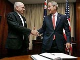 Заместителю премьера Австралии Буш сообщил, что в Ираке американцы "раздают пинки под зад"