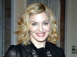 Мадонна расторгла контракт с Warner Music
