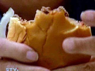В конкурсе по скоростному массовому поеданию гамбургеров, который прошел в городе Чаттануга штата Теннесси, победил 23-летний житель Сан-Хосе Джои Честнат, который проглотил 103 небольших гамбургера
