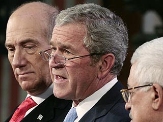 Совместное палестино-израильское заявление о начале мирных переговоров Буш зачитал в очках