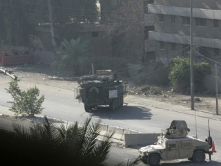 Начиненный взрывчаткой грузовик взлетел на воздух в момент проверки его представителями сил безопасности Ирака на юго-востоке столицы