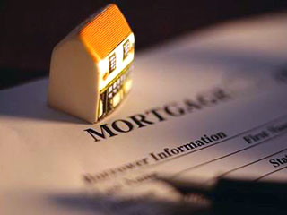 Число случаев лишения прав собственности по закладным на дома в США в январе 2008 года почти удвоилось из-за повышения ставок по кредитам