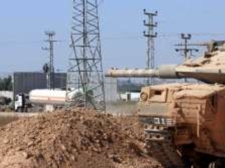 Первый день перемирия в секторе Газа, заключенного между палестинскими группировками и Израилем при посредничестве Египта, "ознаменовался" ограниченными поставками топлива в прибрежный анклав