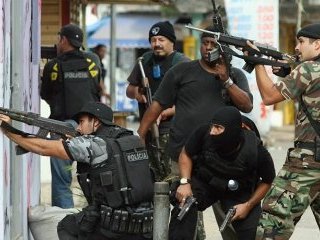 Десять человек погибли и один ранен в результате полицейской операции в трущобном квартале в западной части бразильского города Рио-де-Жанейро