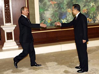 Путин намекнул китайскому премьеру на необходимость беспристрастного судейства на Олимпиаде