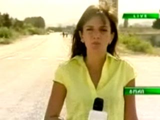 Корреспондентка грузинского Общественного телевидения Тамара Урушадзе была ранена на улице неизвестным снайпером, когда велась прямая трансляция ее репортажа из Гори