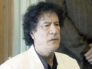 Ливийский лидер Муаммар Каддафи оказывает давление на итальянский парламент