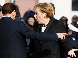 На сей раз Сильвио Берлускони, любящий поставить коллегам рожки, решил поиграть в прятки с канцлером Германии Ангелой Меркель