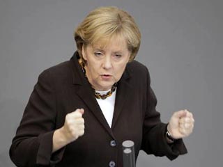 Канцлер Германии Ангела Меркель раскритиковала США и другие правительства за то, что они используют &#8220;дешевые деньги&#8221; в качестве главного инструмента их экономического управления