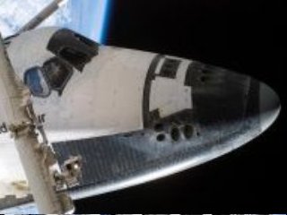 Наполовину праздничным, наполовину рабочим стал четверг для астронавтов пристыкованного к Международной космической станции шаттла Endeavour и экипажа орбитального комплекса
