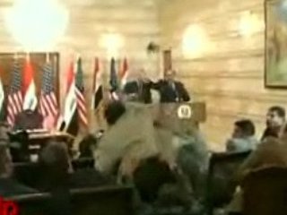 Во время пресс-конференции по итогам переговоров главы Белого дома с премьер-министром Ирака Нури аль-Малики один из представителей местной прессы на арабском обозвал Буша "собакой" и запустил в него своими ботинками