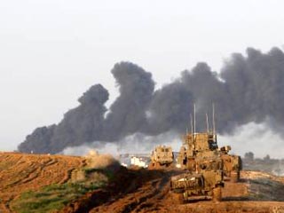 Израильские войска к понедельнику вышли на намеченные рубежи в секторе Газа и начинают следующий этап наземной операции - зачистку территории от палестинских боевиков и "инфраструктуры террора"