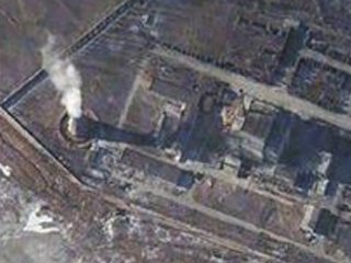 Сделанные из космоса фотографии ракеты-носителя КНДР "Ынха-2" свидетельствуют о том, что в ее головной части действительно установлен спутник, как и заявляют власти в Пхеньяне