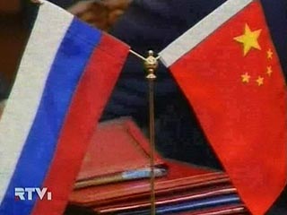 Медведев по-дружески принял в Барвихе китайского министра. Тот передал привет от шефа