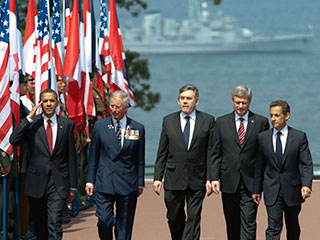 В числе участников памятной церемонии - президенты Франции и США, премьеры Канады и Британии, а также принц Уэльский Чарльз