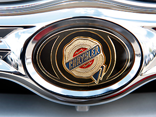 Американский автоконцерн Chrysler и итальянская автомобильная компания Fiat завершили сделку по слиянию