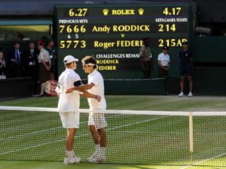 Швейцарец Роджер Федерер выиграл свой шестой за карьеру Уимблдонский теннисный турнир, в финале одолев в пяти сетах американца Энди Роддика со счетом 5:7, 7:6 (8:6), 7:6 (7:5), 3:6, 16:14