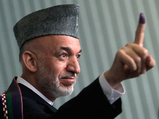 Хамид Карзай лидирует на выборах Афганистана, но пока с маленьким перевесом