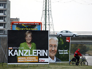 В Германии сегодня проводятся парламентские выборы, по итогам которых формируется правительство страны и определяется его глава - федеральный канцлер